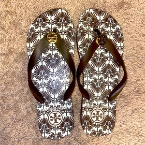 Tory Burch Flip Flops. Brown and white. No size listed but fit a true 7.5.